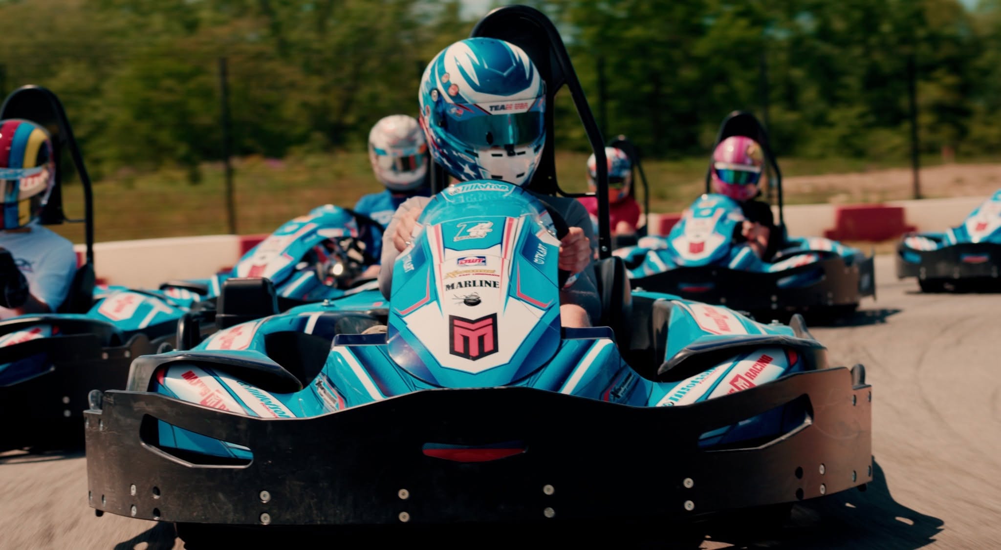 Drivers lined up in Tillotson rental karts on the outdoor circuit at Lorain Ohio KartPlex